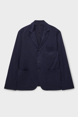 Navy blue blazer on a light gray background