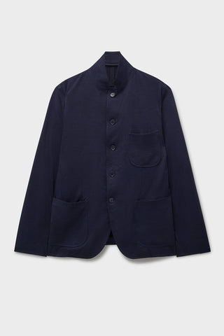 Navy blue jacket with button details on a light gray background